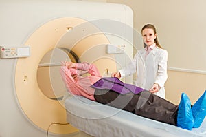 Woman Technologist testing patient photo