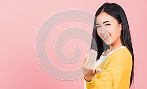 Woman teen smile positive friendly making gesture hand inviting to come here