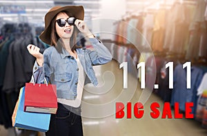 Woman teen smiling standing with sunglasses and hat she excited holding shopping bags multi color