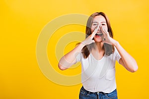 Woman teen standing big shout out with hands next mouth giving excited positive