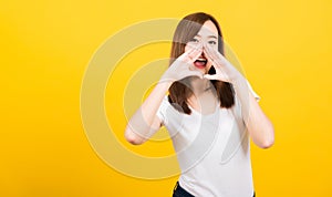 Woman teen standing big shout out with hands next mouth giving excited positive