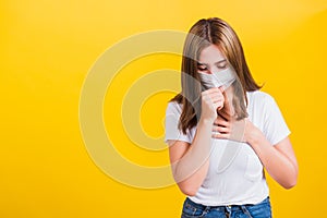 Woman teen standing cough in mask protection from virus epidemic or air pollution