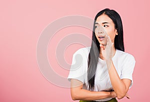 Woman teen standing hand on mouth talking whisper secret rumor