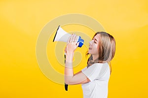 Woman teen standing making announcement message shouting screaming in megaphone