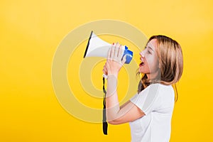 Woman teen standing making announcement message shouting screaming in megaphone