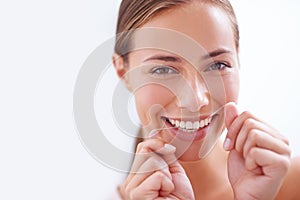 Woman, teeth and floss in portrait for dental hygiene with closeup, morning and cleaning mouth for dentistry. Female
