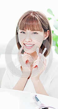 Woman with teeth invisible brace