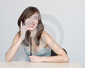 The woman. Telephone conversation.