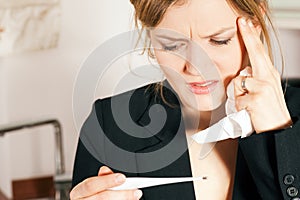 Woman with temperature and flu