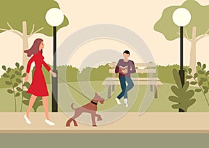 Woman and terrier dog walking in the park