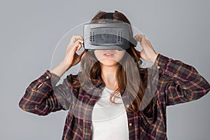 Woman testing a virtual reality helmet