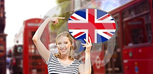 Woman with text bubble of british flag in london