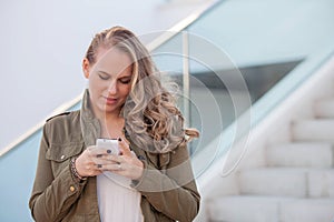 Woman texting on cell or mobile phone