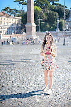Woman texting happy on mobile phone