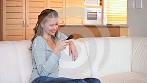 Woman texting on her mobile phone