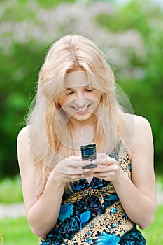 Woman texting on mobile phone