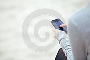 Woman texting on a mobile phone