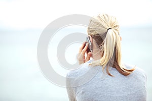 Woman texting on a mobile phone