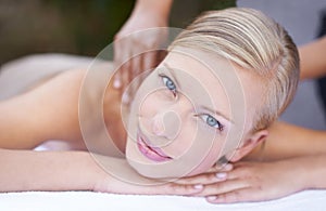 Woman, therapist and massage to relax, portrait and spa for treatment and stress relief therapy. Sleeping, masseuse and