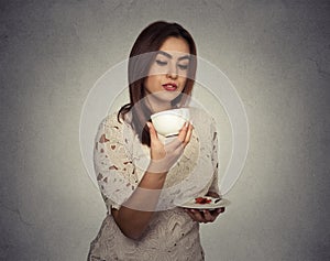 Woman thinking guessing on coffee grounds