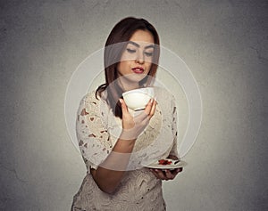 Woman thinking guessing on coffee grounds photo