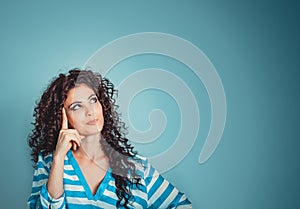 Woman thinking looking up  with long hair