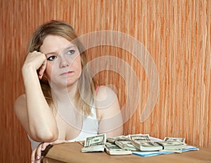 Woman thinks about the financial issue