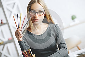 Woman threatening with pencil claws