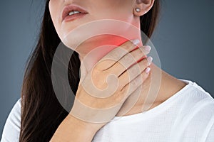 Woman With Throat Pain