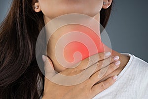 Woman With Throat Pain