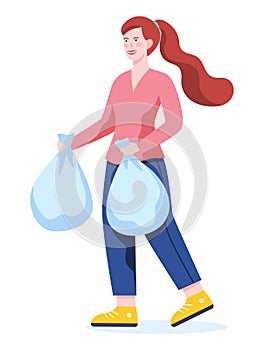 Woman throw bag with garbage in a trash bin