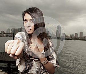 Woman throwing a punch