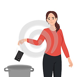 Woman throws mobile phone into the trash. Concept of digital detox, disconnecting, mediastika, device free zone, internet