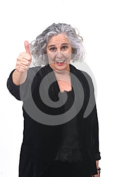 Woman thumps up on white background