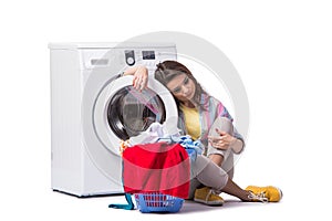 The woman tired after doing laundry isolated on white