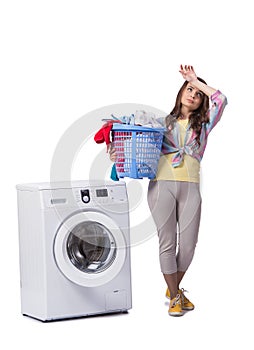 The woman tired after doing laundry isolated on white