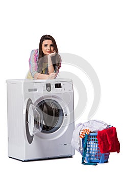 The woman tired after doing laundry isolated on white