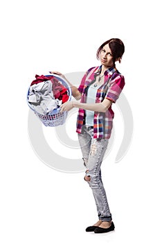 The woman tired after doing laundry isolated on white