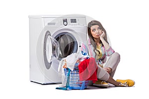 The woman tired after doing laundry isolated on white