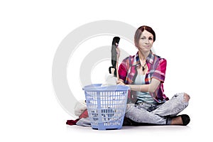 The woman tired after doing laundry isolated on white