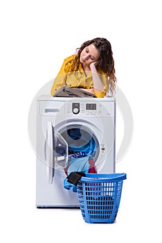 The woman tired after doing laundry isolated on white