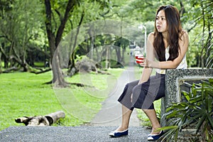 Woman tired drink in hand