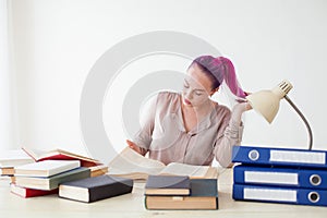 Woman tired work in the Office and reading books