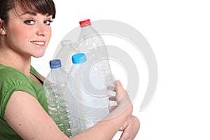 Woman about to recycle