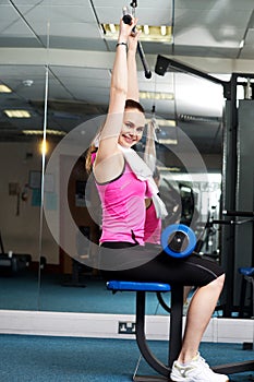 Woman toning her upper and core muscles