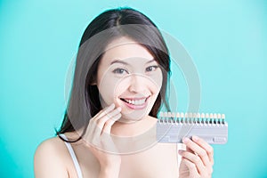 Woman with tooth whiten