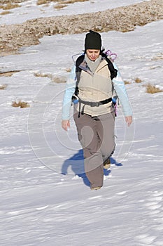 Woman in the top of a in mountain hiking