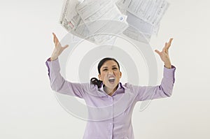 Woman Tossing Forms In The Air