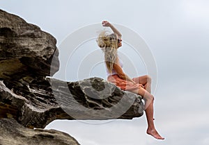 Woman tossing her hair in the outdoors