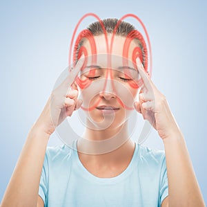 Woman touches head, the temporal region of red photo